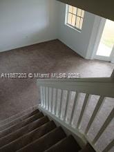 1958 Southwest 60th Terrace, Unit 1958 North Lauderdale, FL 33068 - Photo 23 of 24 a locker room with wooden floor
