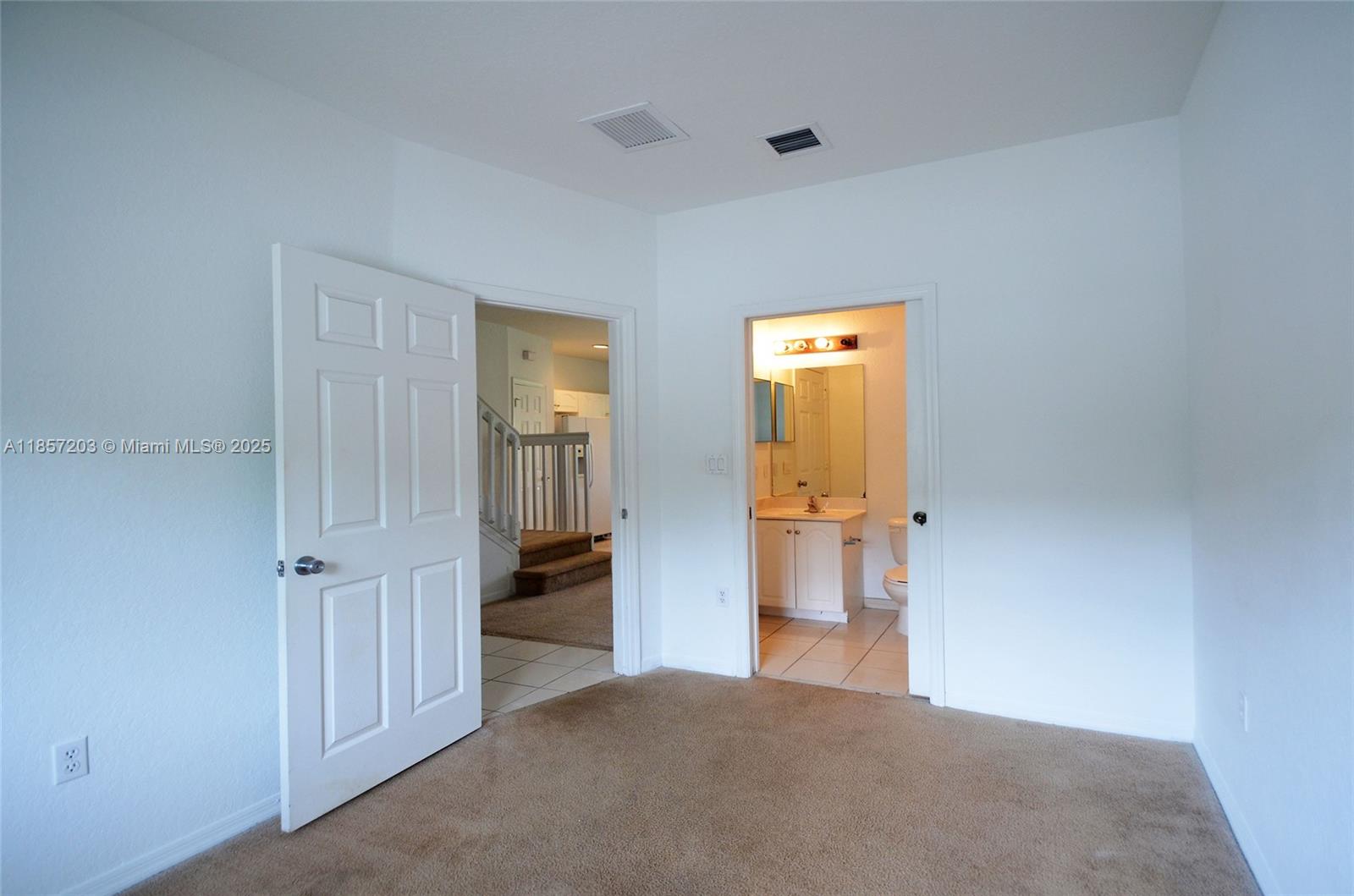 1958 Southwest 60th Terrace, Unit 1958 North Lauderdale, FL 33068 - Photo 6 of 24 a view of empty room with wooden floor