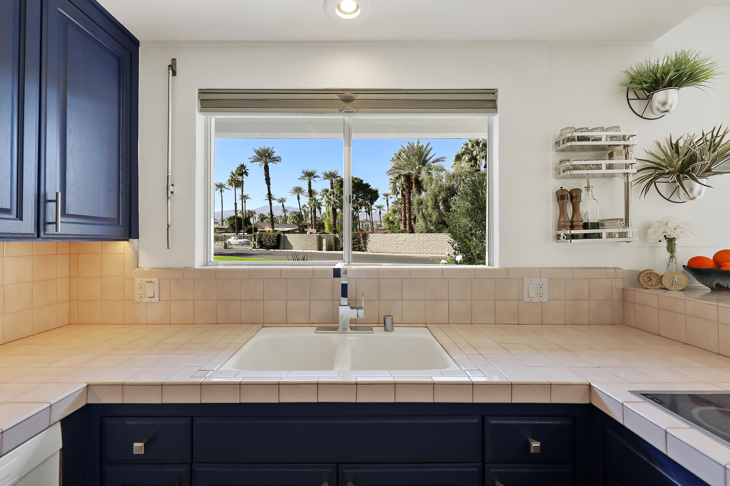 45204 Ave Codorniz Indian Wells, CA 92210 - Photo 13 of 36 a bathroom with a sink and a window