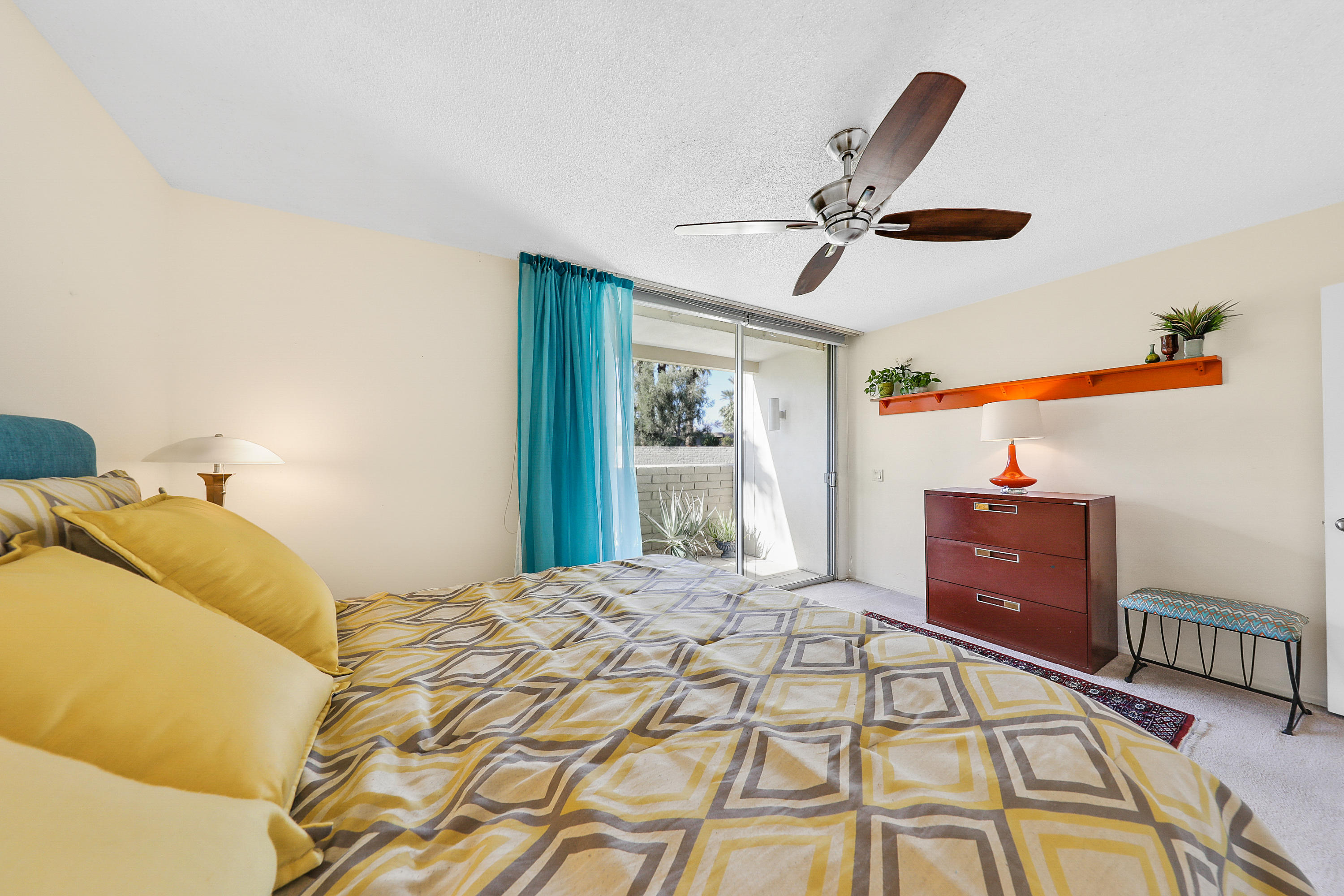 45204 Ave Codorniz Indian Wells, CA 92210 - Photo 18 of 36 a bedroom with a bed and a window