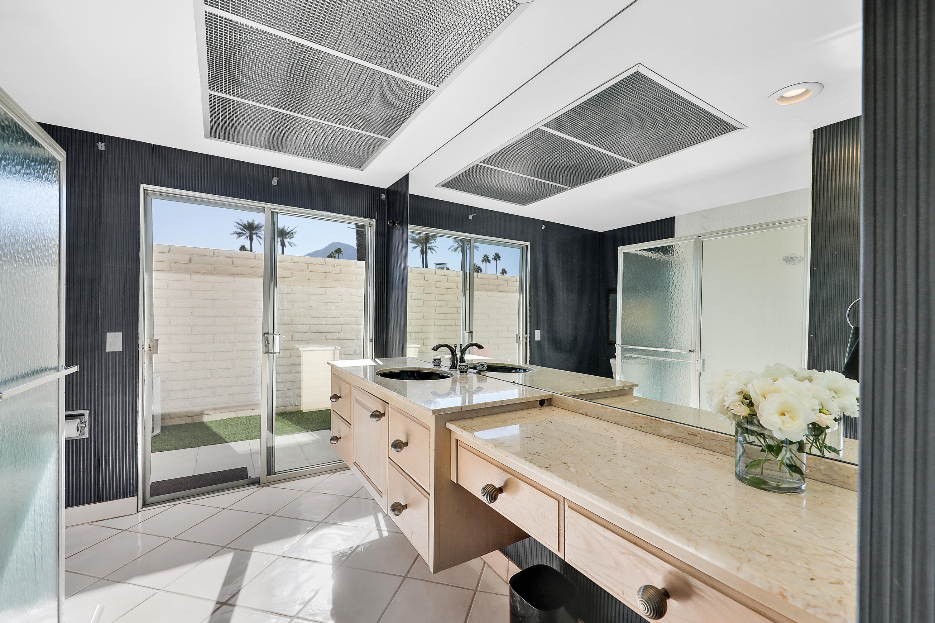 45204 Ave Codorniz Indian Wells, CA 92210 - Photo 20 of 36 a room with sink and view of living room