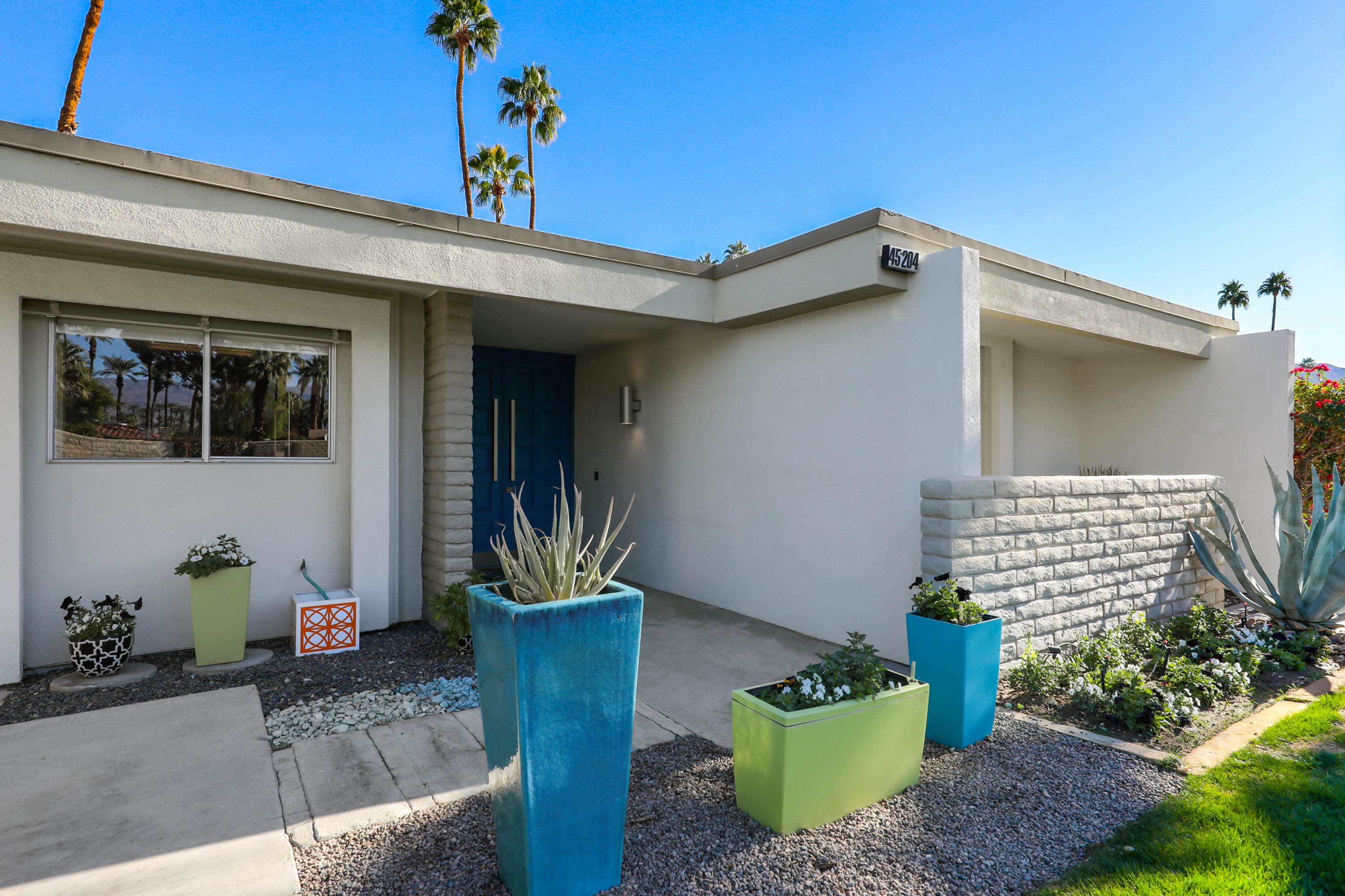 45204 Ave Codorniz Indian Wells, CA 92210 - Photo 3 of 36 a front view of a house