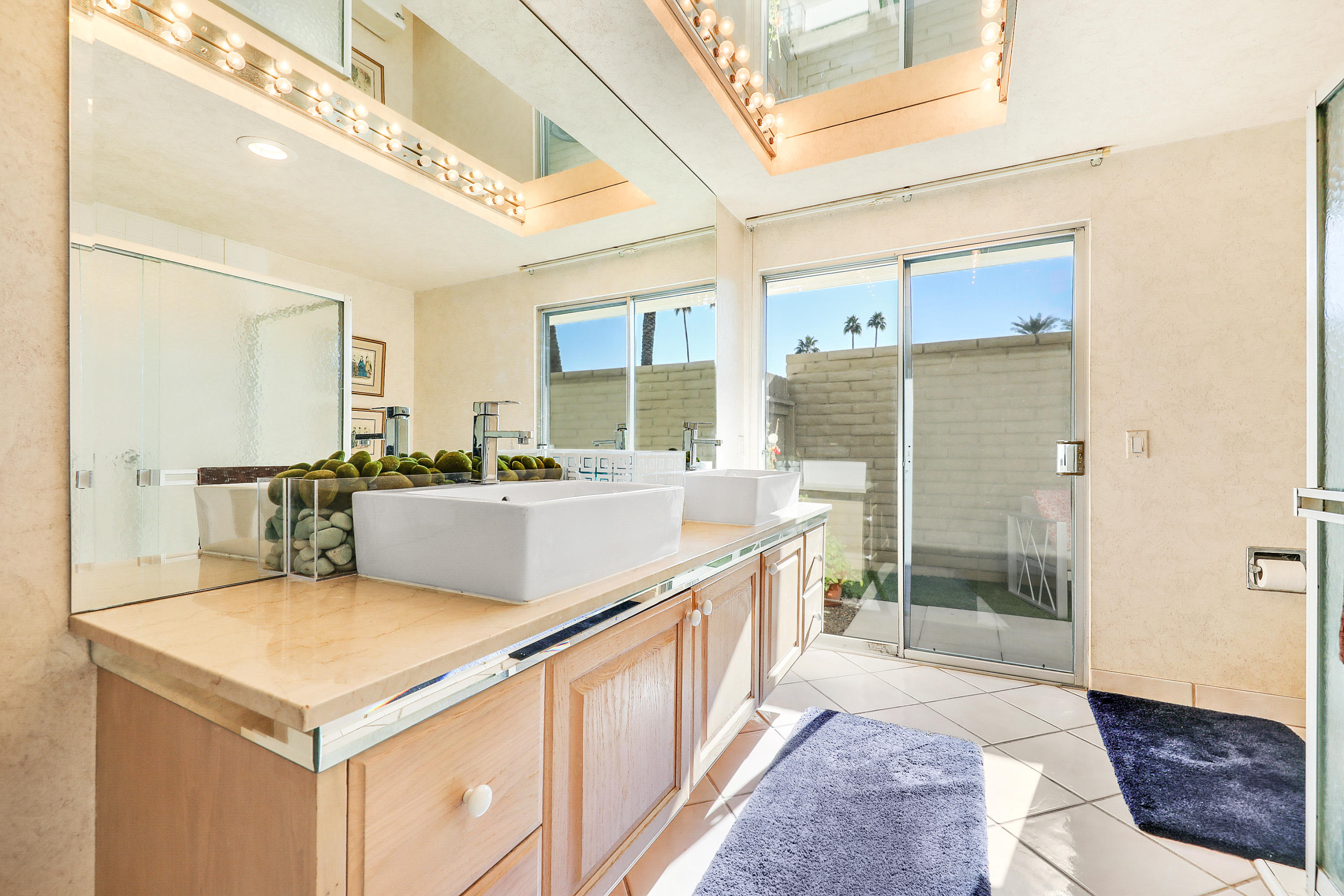 45204 Ave Codorniz Indian Wells, CA 92210 - Photo 23 of 36 a large white kitchen with a large window