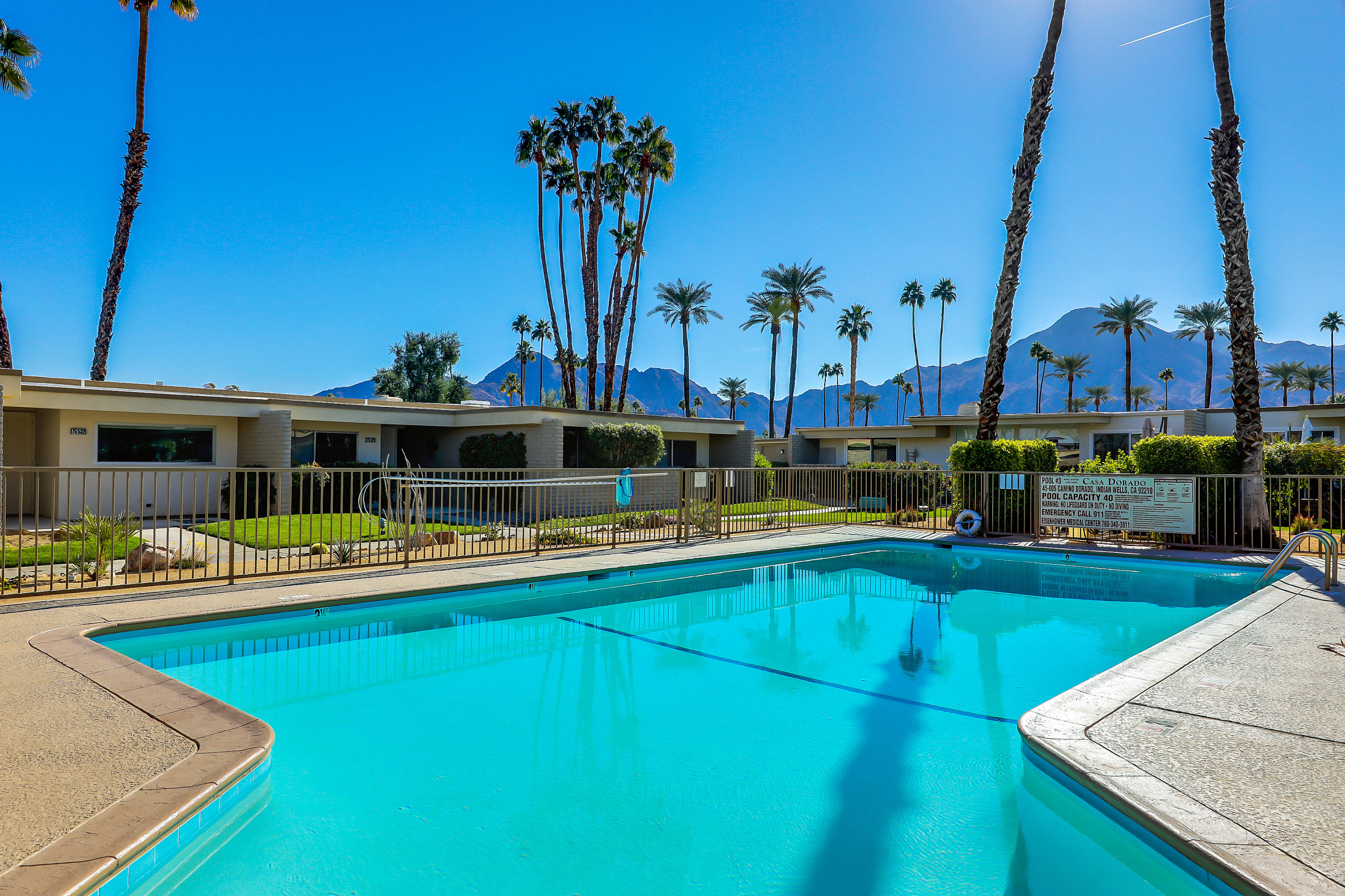 45204 Ave Codorniz Indian Wells, CA 92210 - Photo 31 of 36 a view of a house with swimming pool