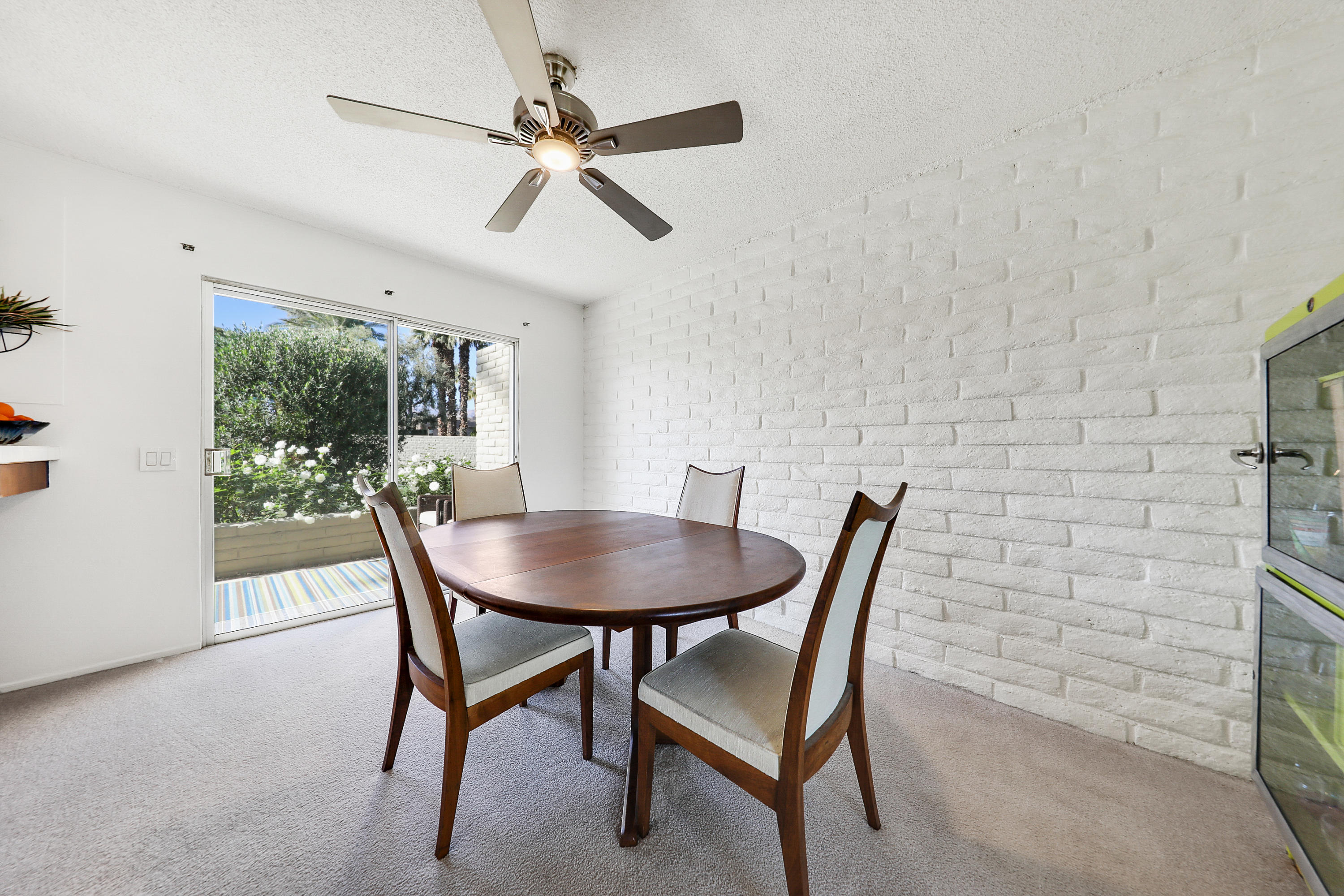 45204 Ave Codorniz Indian Wells, CA 92210 - Photo 9 of 36 a view of a dining room with furniture