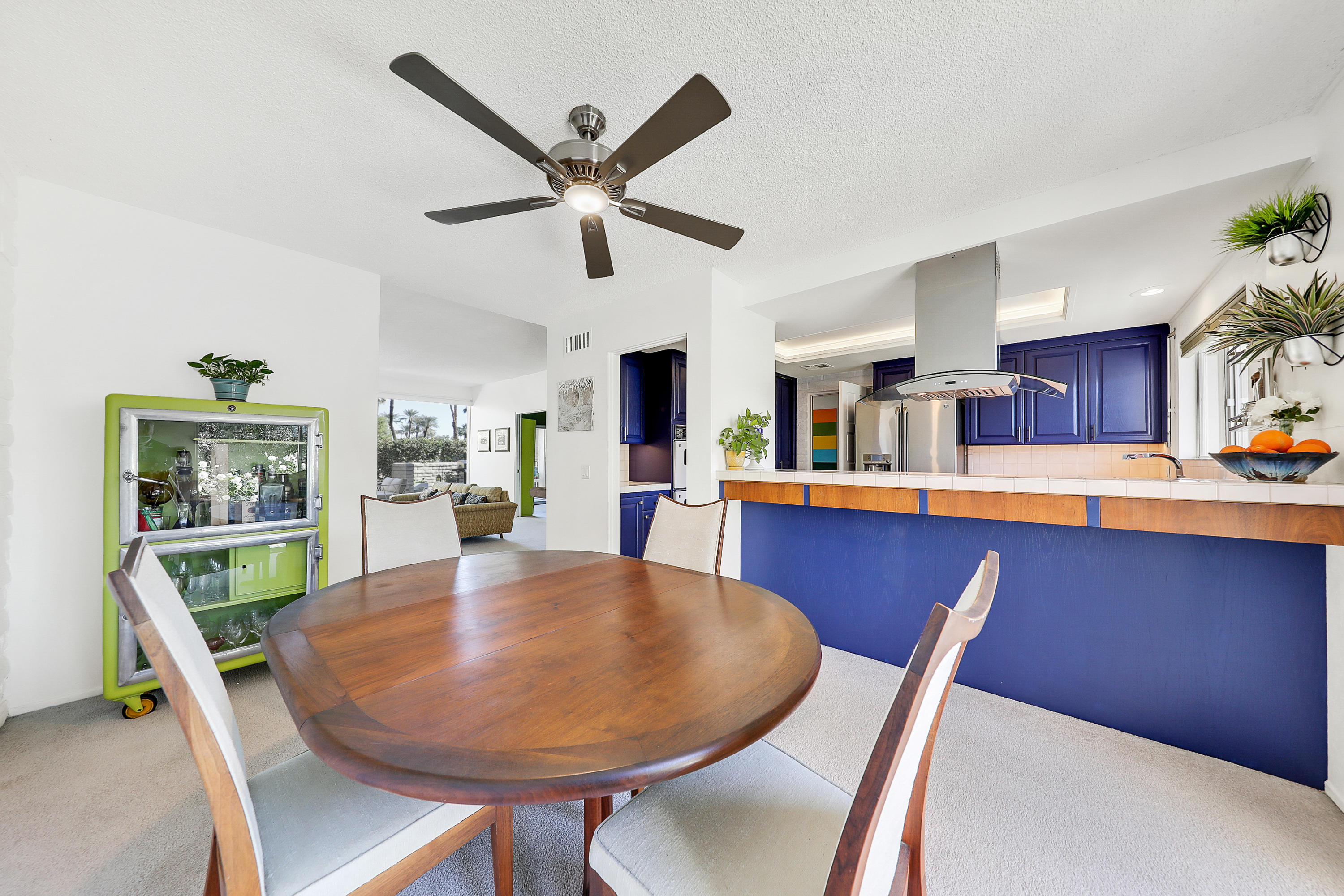 45204 Ave Codorniz Indian Wells, CA 92210 - Photo 10 of 36 a dining room with furniture and window