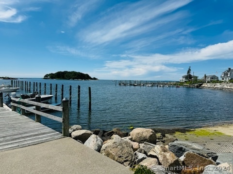 15 Griswold Road East Lyme, CT 06357 - Photo 13 of 16 a view of a terrace with chairs
