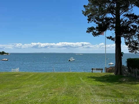 15 Griswold Road East Lyme, CT 06357 - Photo 8 of 16 a view of a lake with a yard