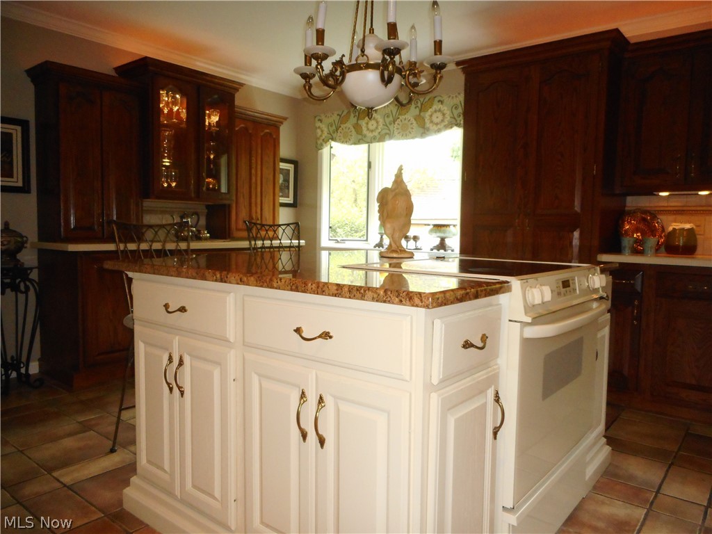 13851 Watt Road Novelty, OH 44072 - Photo 8 of 28 Another view of the island and kitchen.