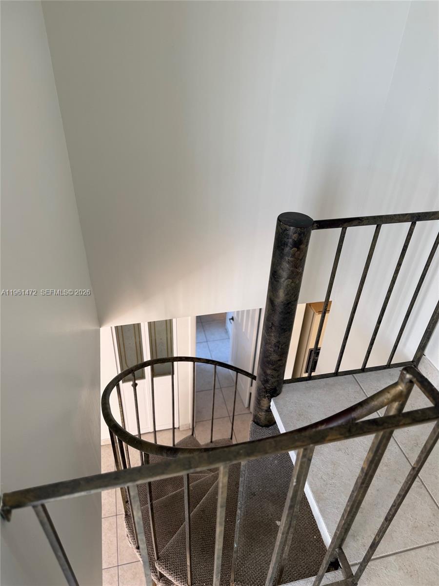 2500 Southwest 122nd Court Miami, FL 33175 - Photo 12 of 19 a view of staircase with a rug