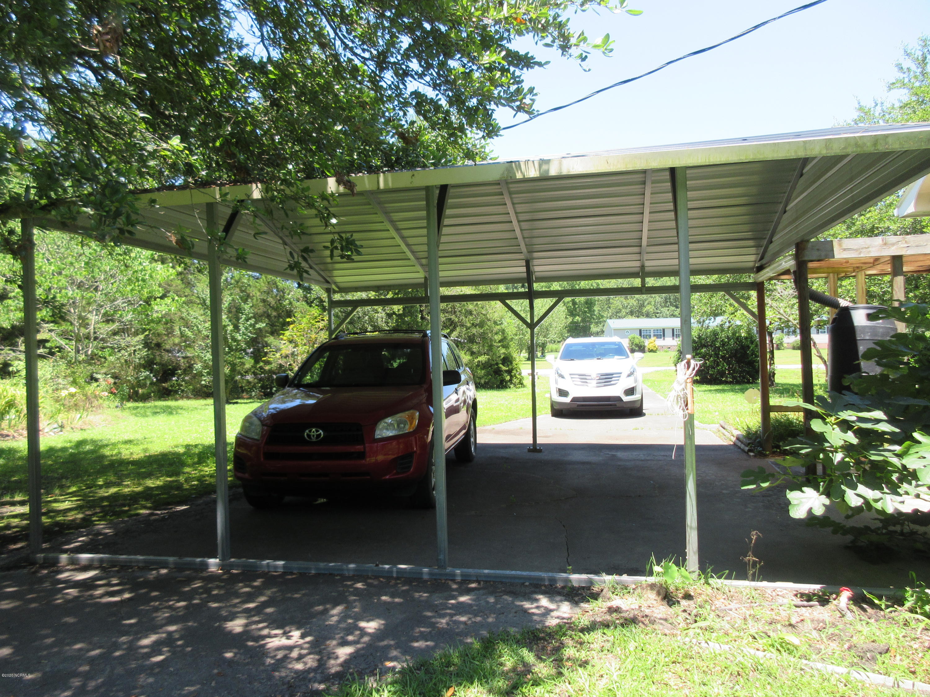 201 Lightwood Knot Road Deep Run, NC 28525 - Photo 4 of 19 Metal Carport Attached