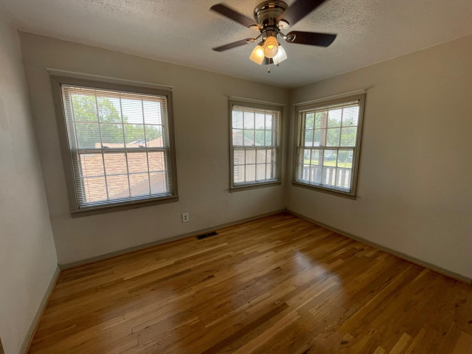 3018 29th Street Lubbock, TX 79410 - Photo 5 of 14 a view of an empty room and window