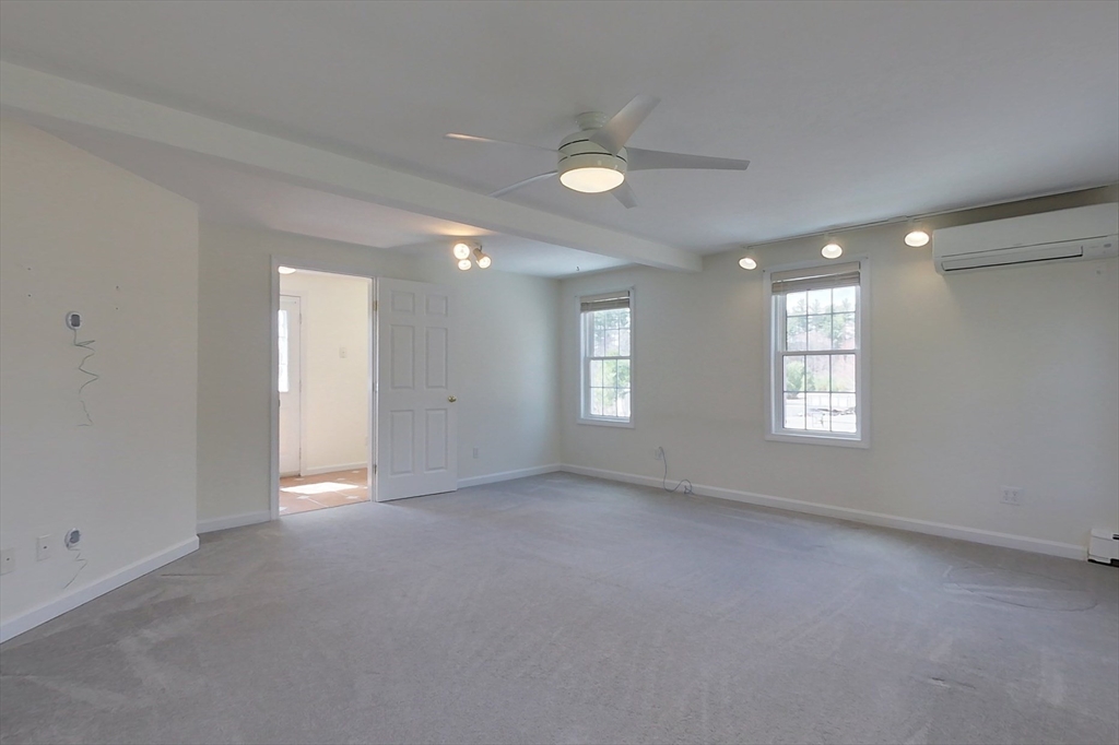78 Mason Road Townsend, MA 01474 - Photo 15 of 42 an empty room with windows and closet