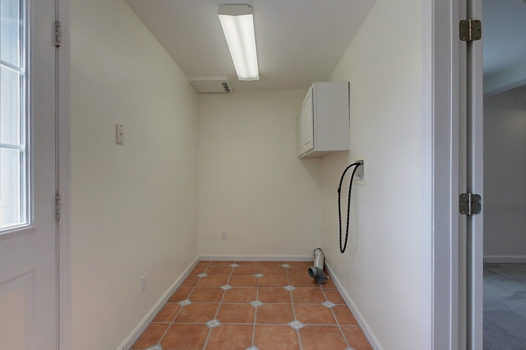 78 Mason Road Townsend, MA 01474 - Photo 17 of 42 a view of a room with rack and white walls