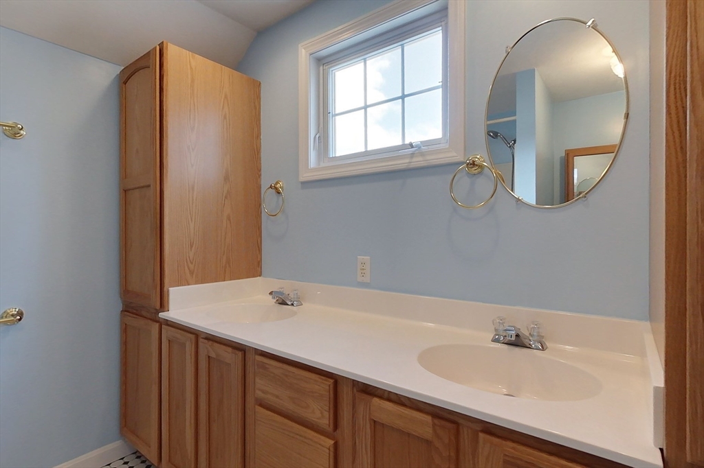 78 Mason Road Townsend, MA 01474 - Photo 23 of 42 a bathroom with a sink and a mirror