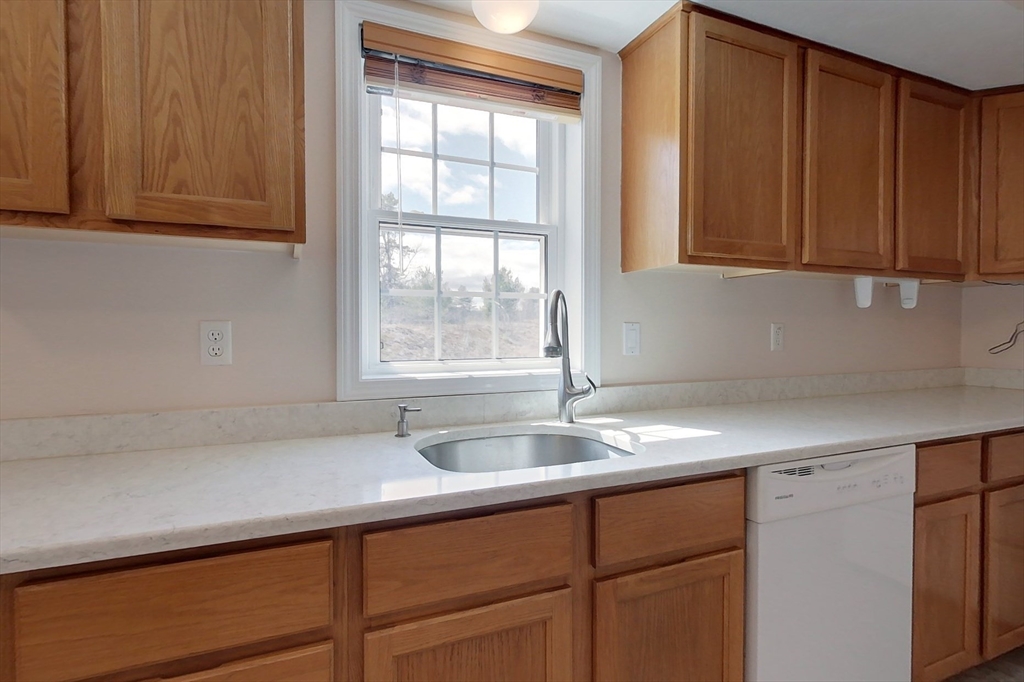 78 Mason Road Townsend, MA 01474 - Photo 3 of 42 a kitchen with a sink cabinets and window