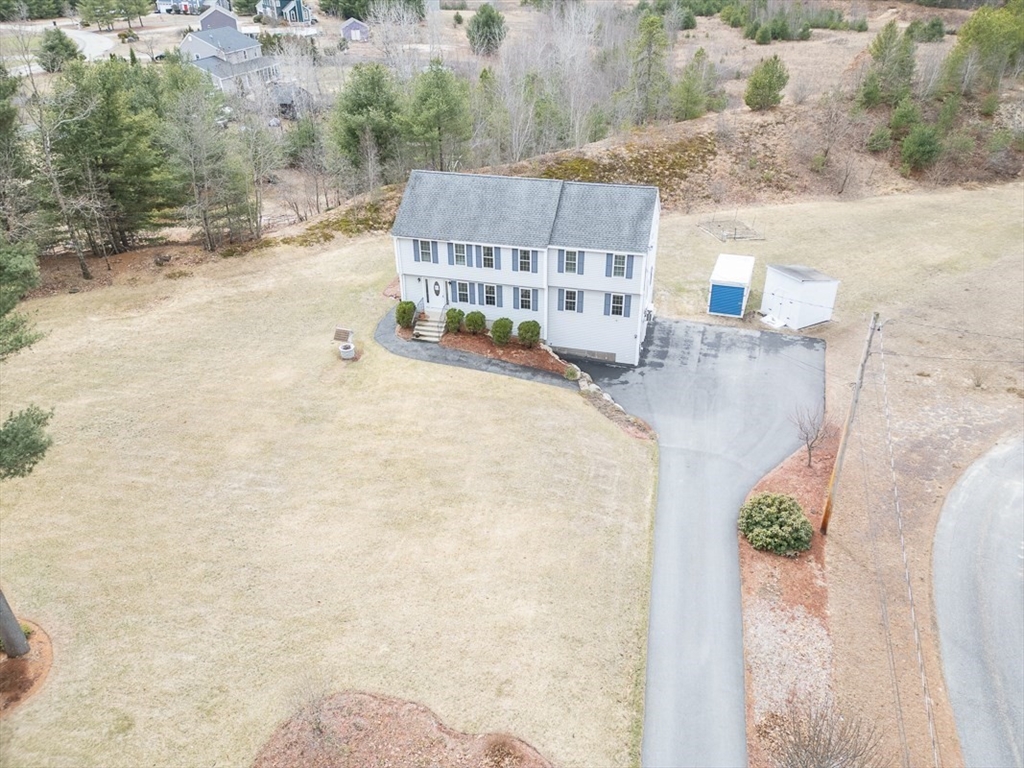 78 Mason Road Townsend, MA 01474 - Photo 31 of 42 a view of a swimming pool with a patio