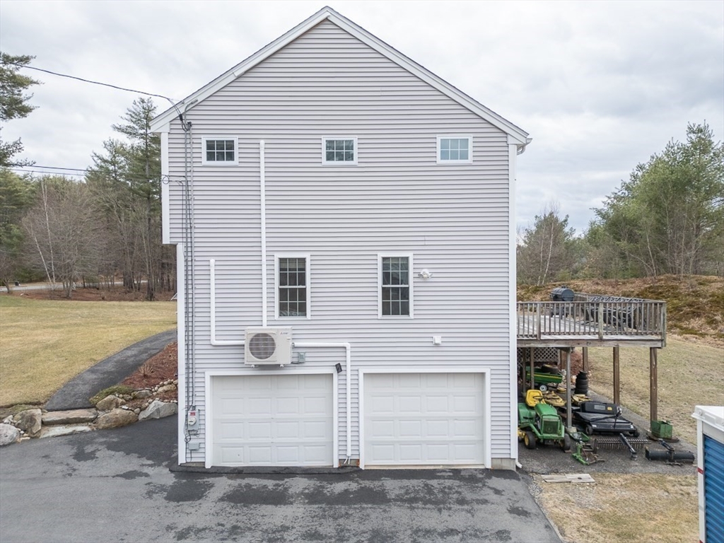 78 Mason Road Townsend, MA 01474 - Photo 32 of 42 a view of a house with a yard