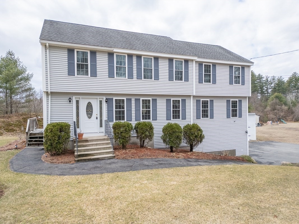 78 Mason Road Townsend, MA 01474 - Photo 39 of 42 a front view of a house with yard