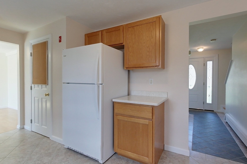 78 Mason Road Townsend, MA 01474 - Photo 5 of 42 a white refrigerator freezer sitting in a kitchen