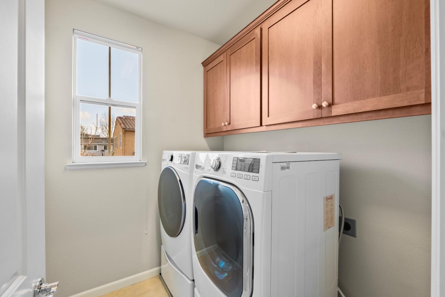 719 Raines Terrace Sunnyvale, CA 94087 - Photo 19 of 47 a utility room with dryer and washer