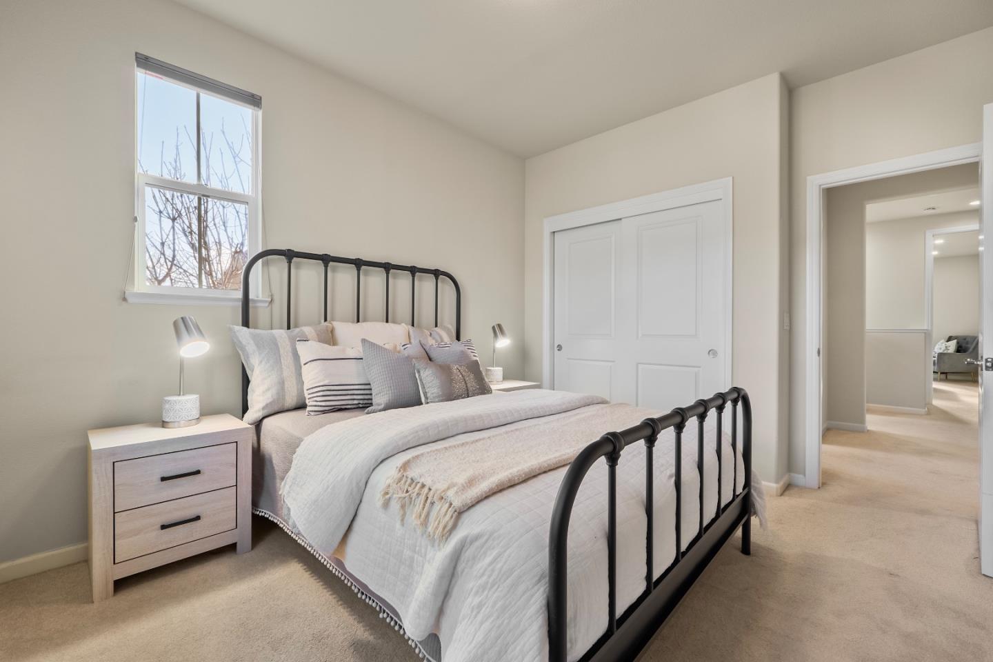 719 Raines Terrace Sunnyvale, CA 94087 - Photo 21 of 47 a bed room with a bed and a window