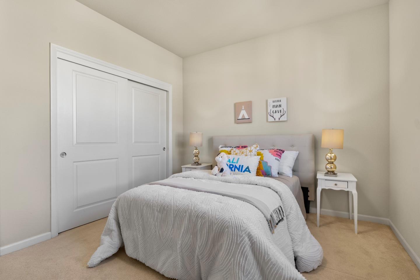 719 Raines Terrace Sunnyvale, CA 94087 - Photo 24 of 47 a bedroom with a bed and a table