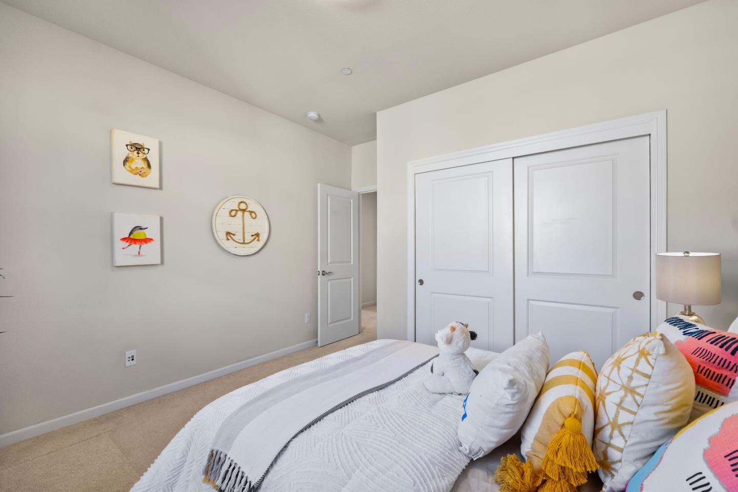 719 Raines Terrace Sunnyvale, CA 94087 - Photo 25 of 47 a bedroom with a bed and cupboard