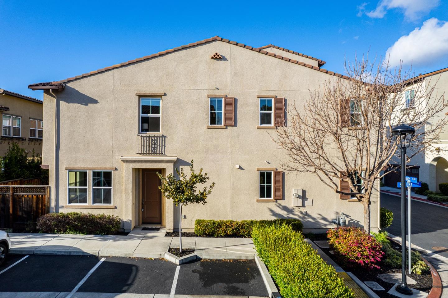 719 Raines Terrace Sunnyvale, CA 94087 - Photo 46 of 47 a view of a white house with a yard