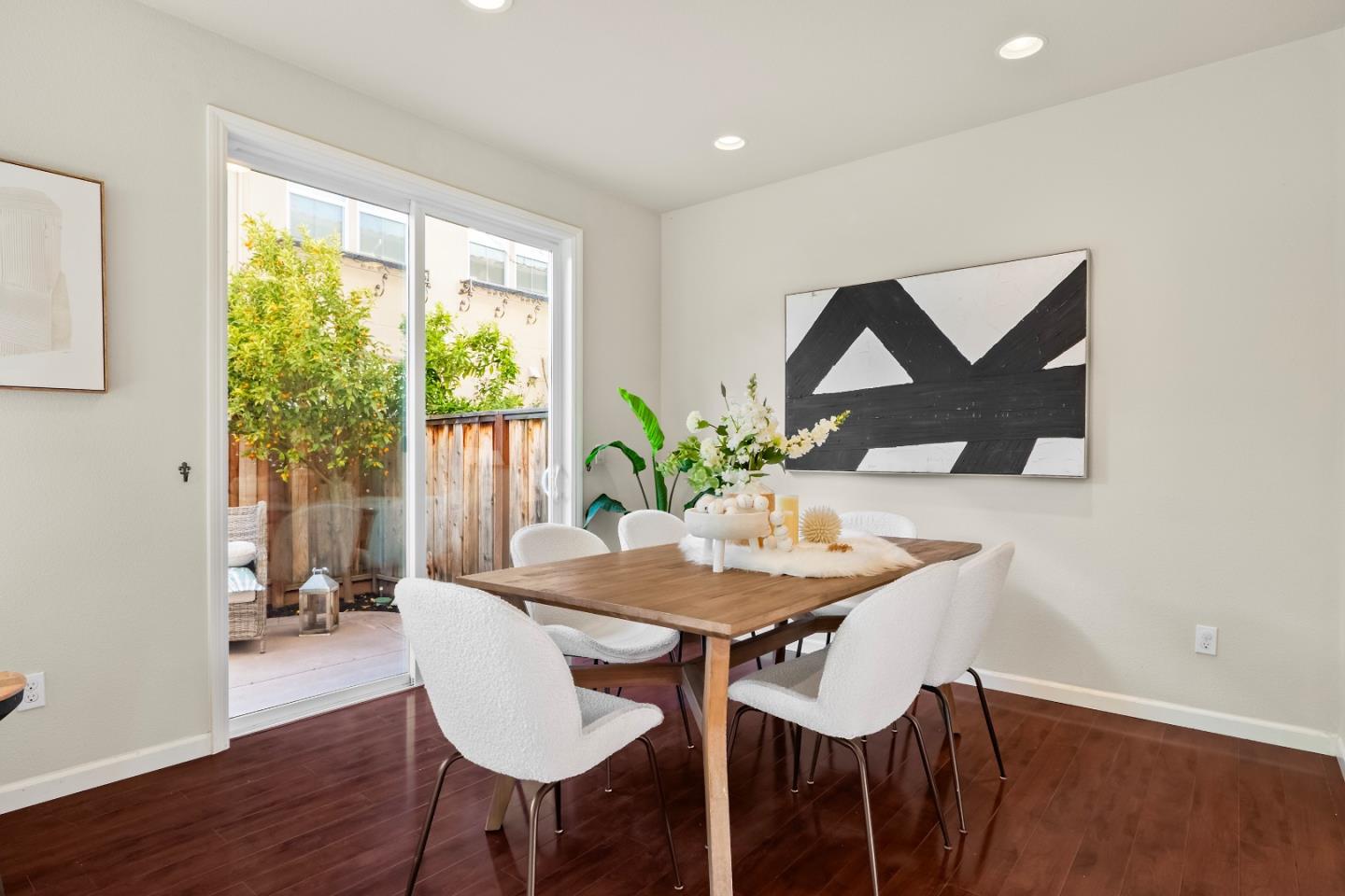 719 Raines Terrace Sunnyvale, CA 94087 - Photo 6 of 47 a view of a dining room with furniture and wooden floor