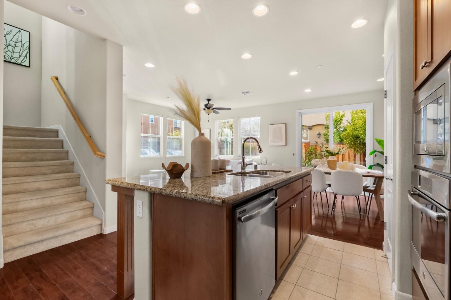 719 Raines Terrace Sunnyvale, CA 94087 - Photo 9 of 47 a kitchen with counter top space and windows