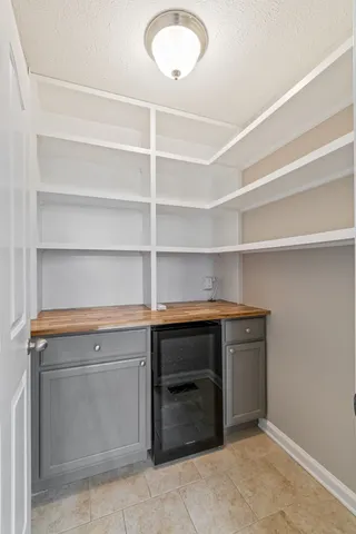 a hallway with washer and dryer