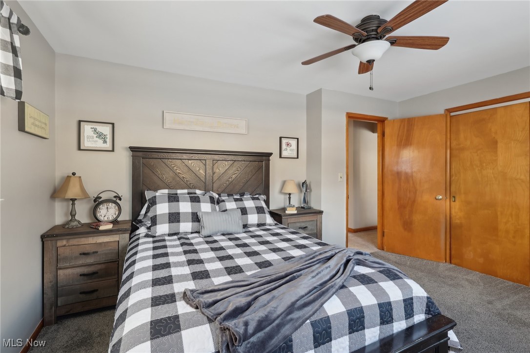 2634 Brunswick Road Youngstown, OH 44511 - Photo 23 of 50 Carpeted bedroom featuring ceiling fan and a closet