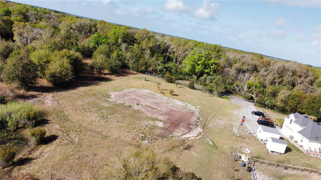 1043 Hazen Road DeLand, FL 32720 - Photo 12 of 16 a view of a yard with mountain