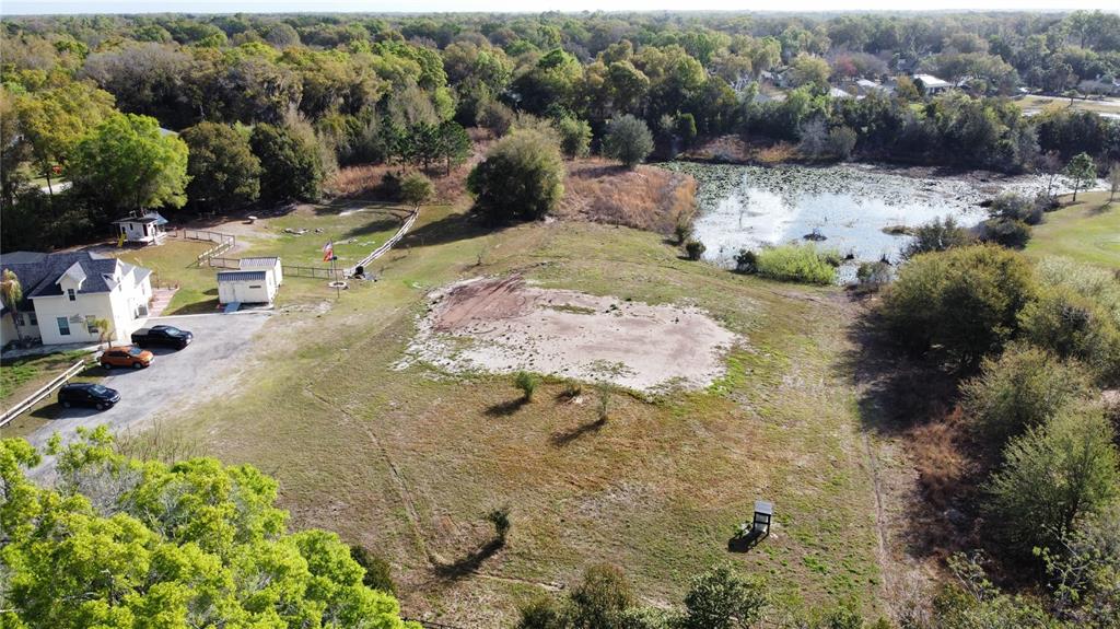 1043 Hazen Road DeLand, FL 32720 - Photo 14 of 16 a view of a backyard of the house