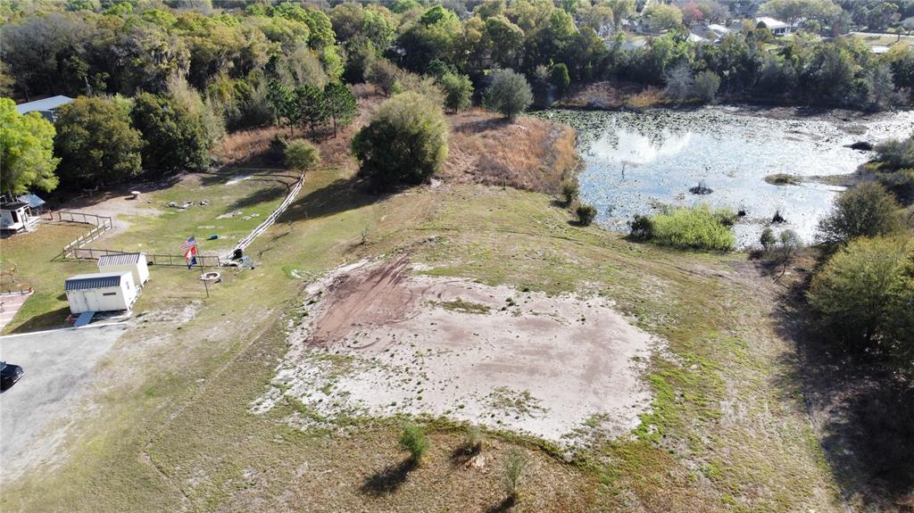 1043 Hazen Road DeLand, FL 32720 - Photo 15 of 16 a view of a yard with large trees