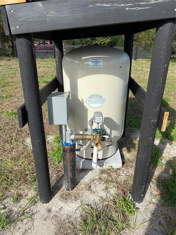 1043 Hazen Road DeLand, FL 32720 - Photo 4 of 16 a view of living room with furniture and a fireplace