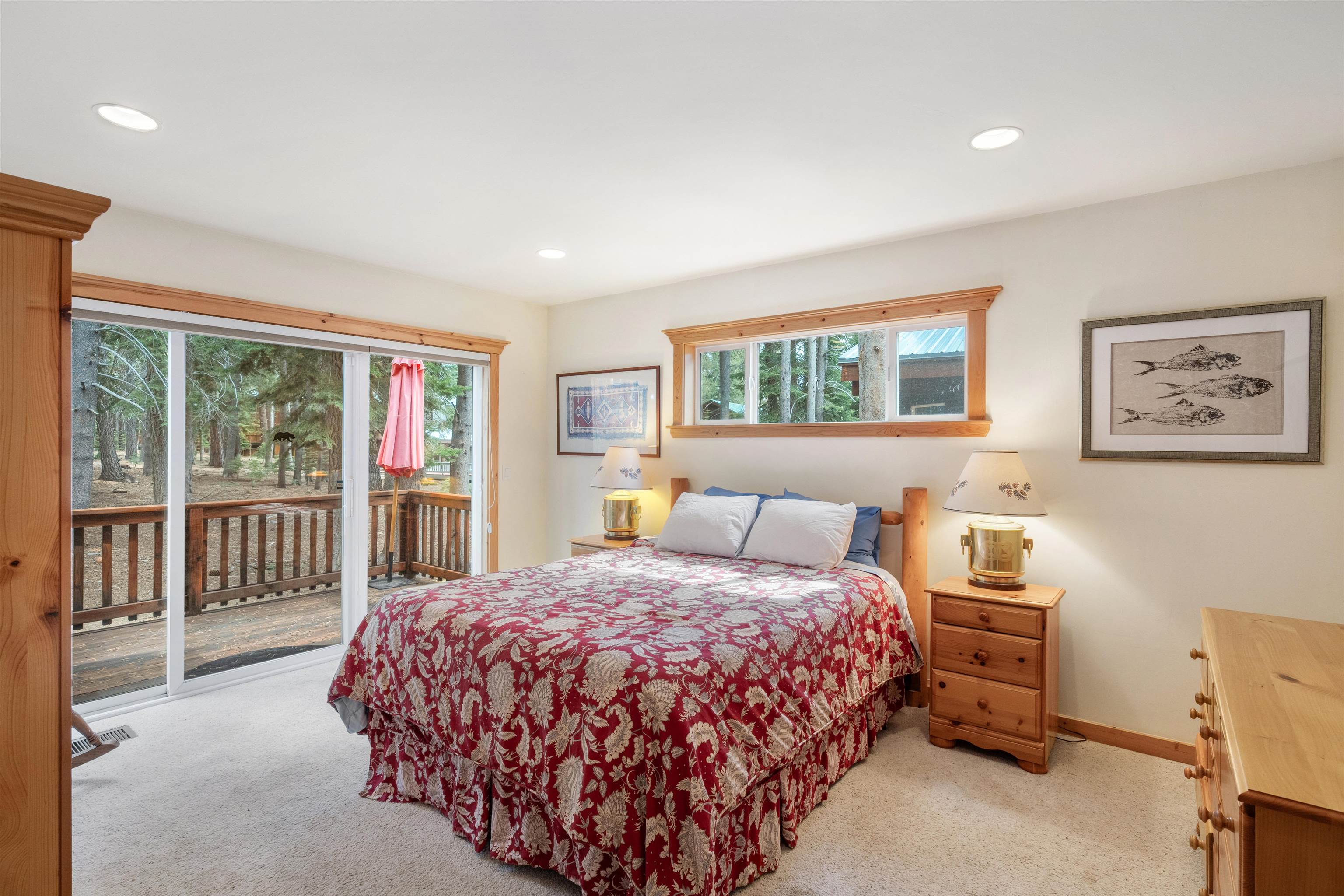 12851 Ski View Loop Truckee, CA 96161 - Photo 14 of 28 a bedroom with a large bed and a window