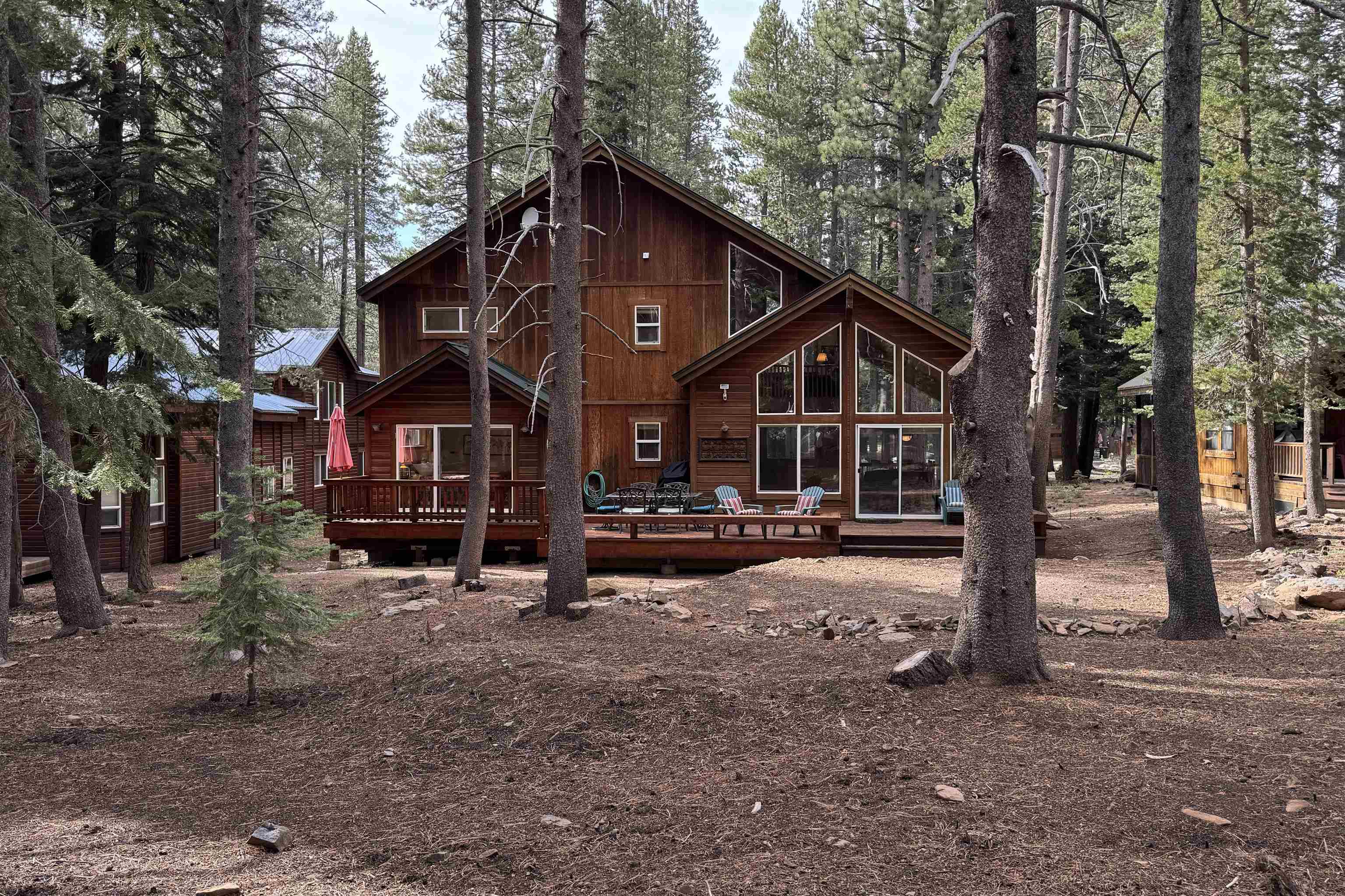 12851 Ski View Loop Truckee, CA 96161 - Photo 2 of 28 a view of a house with a yard and sitting area