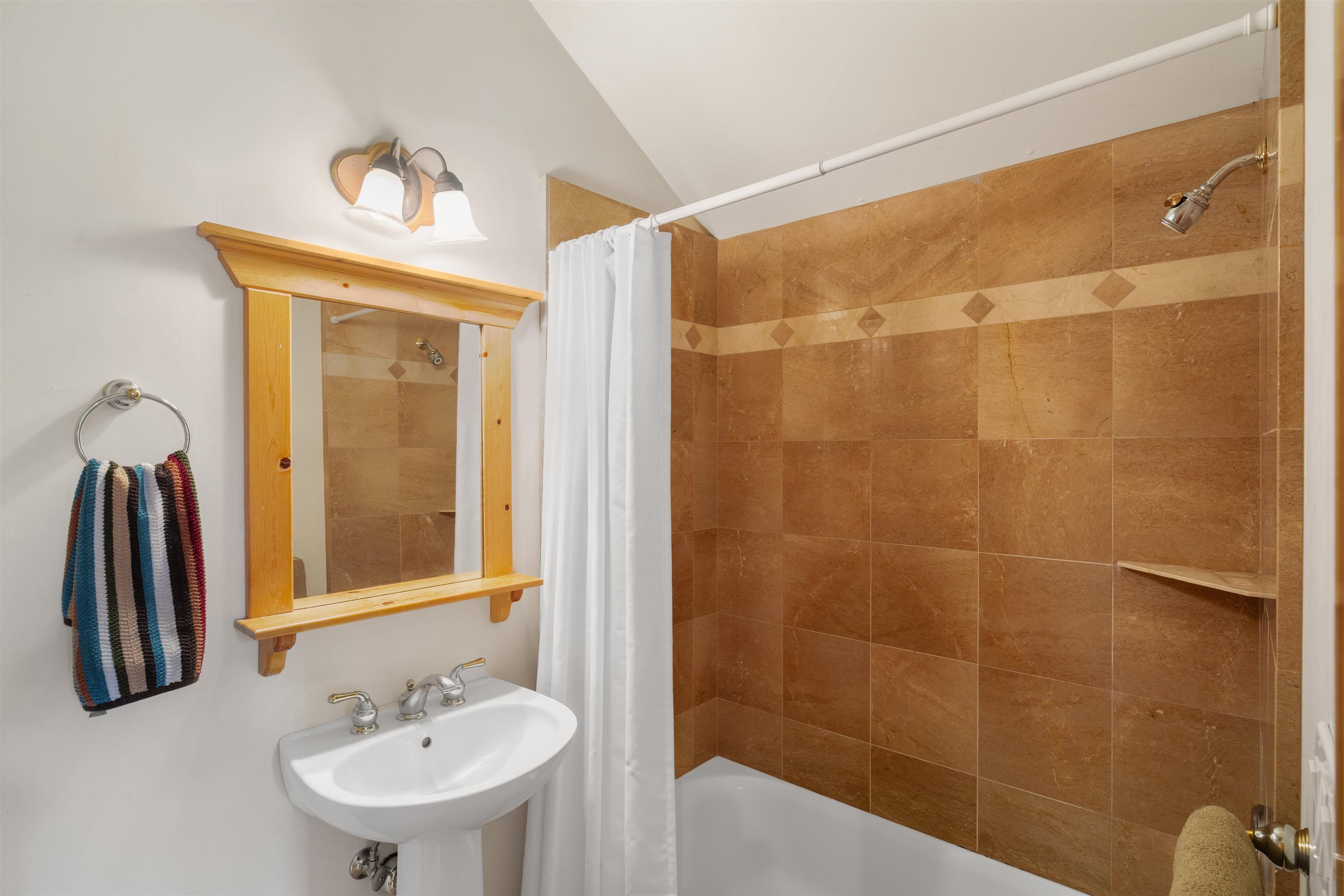 12851 Ski View Loop Truckee, CA 96161 - Photo 25 of 28 a bathroom with a sink and mirror