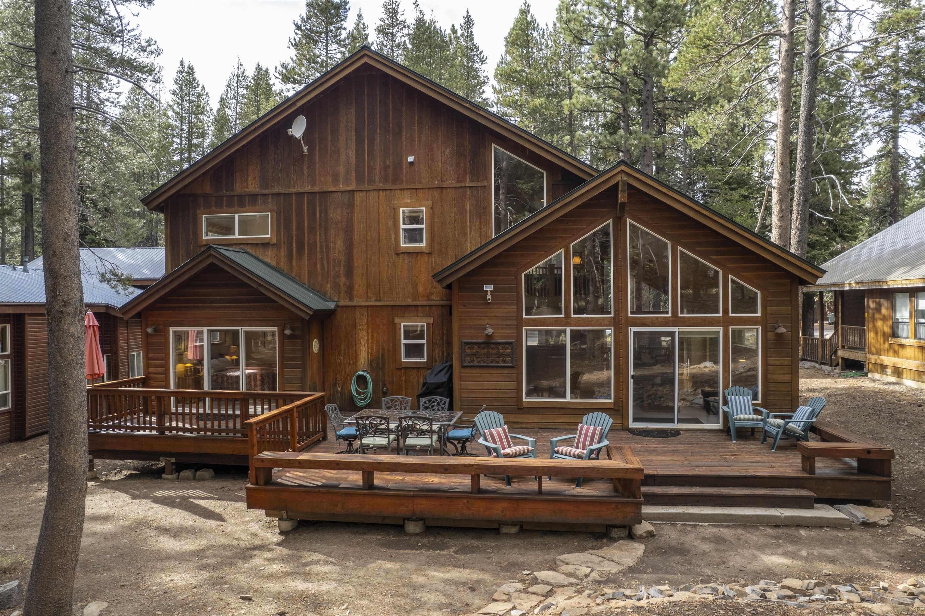 12851 Ski View Loop Truckee, CA 96161 - Photo 27 of 28 a front view of a house with a yard outdoor seating and mountain view