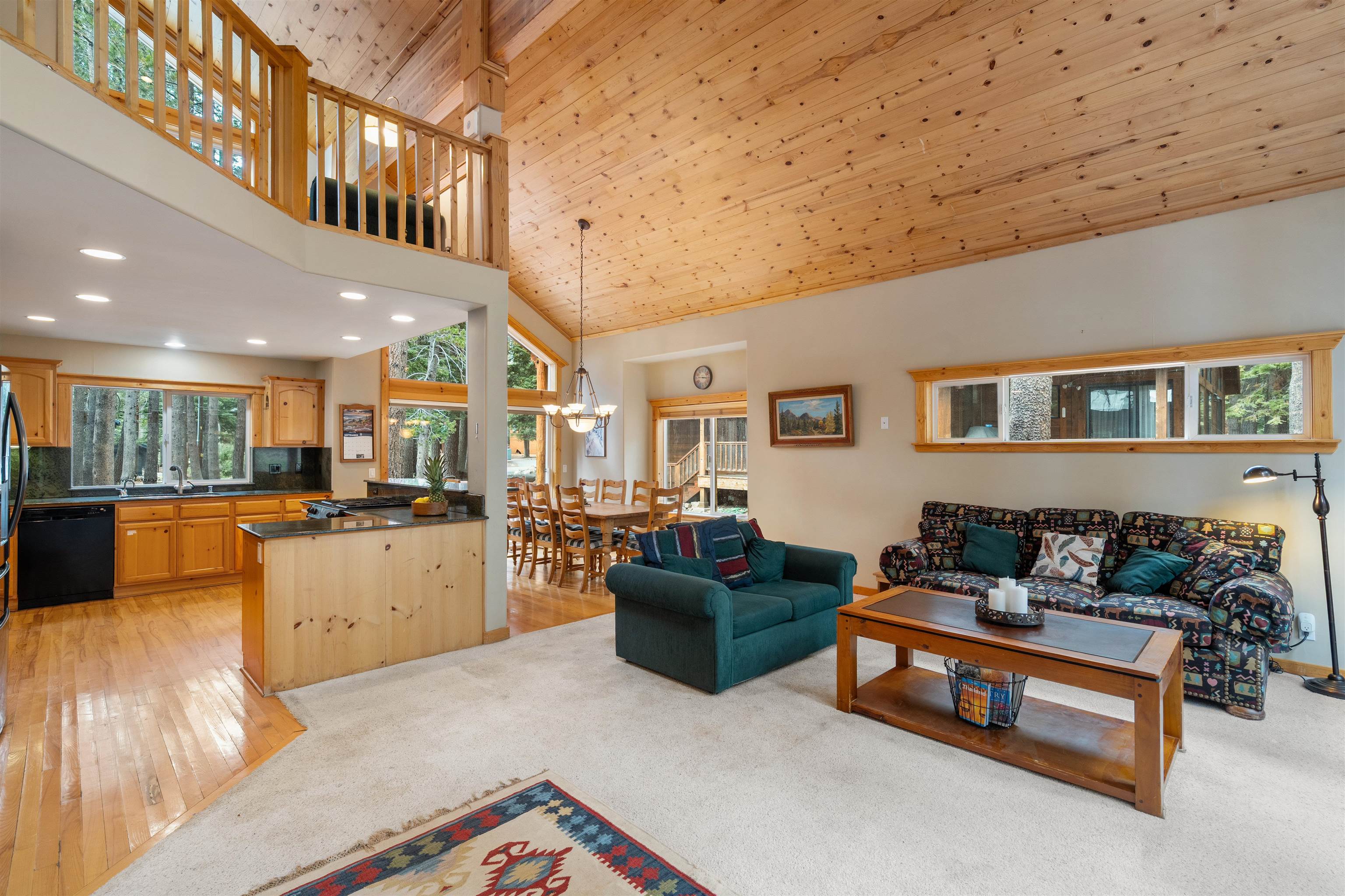 12851 Ski View Loop Truckee, CA 96161 - Photo 7 of 28 a living room with furniture and kitchen view