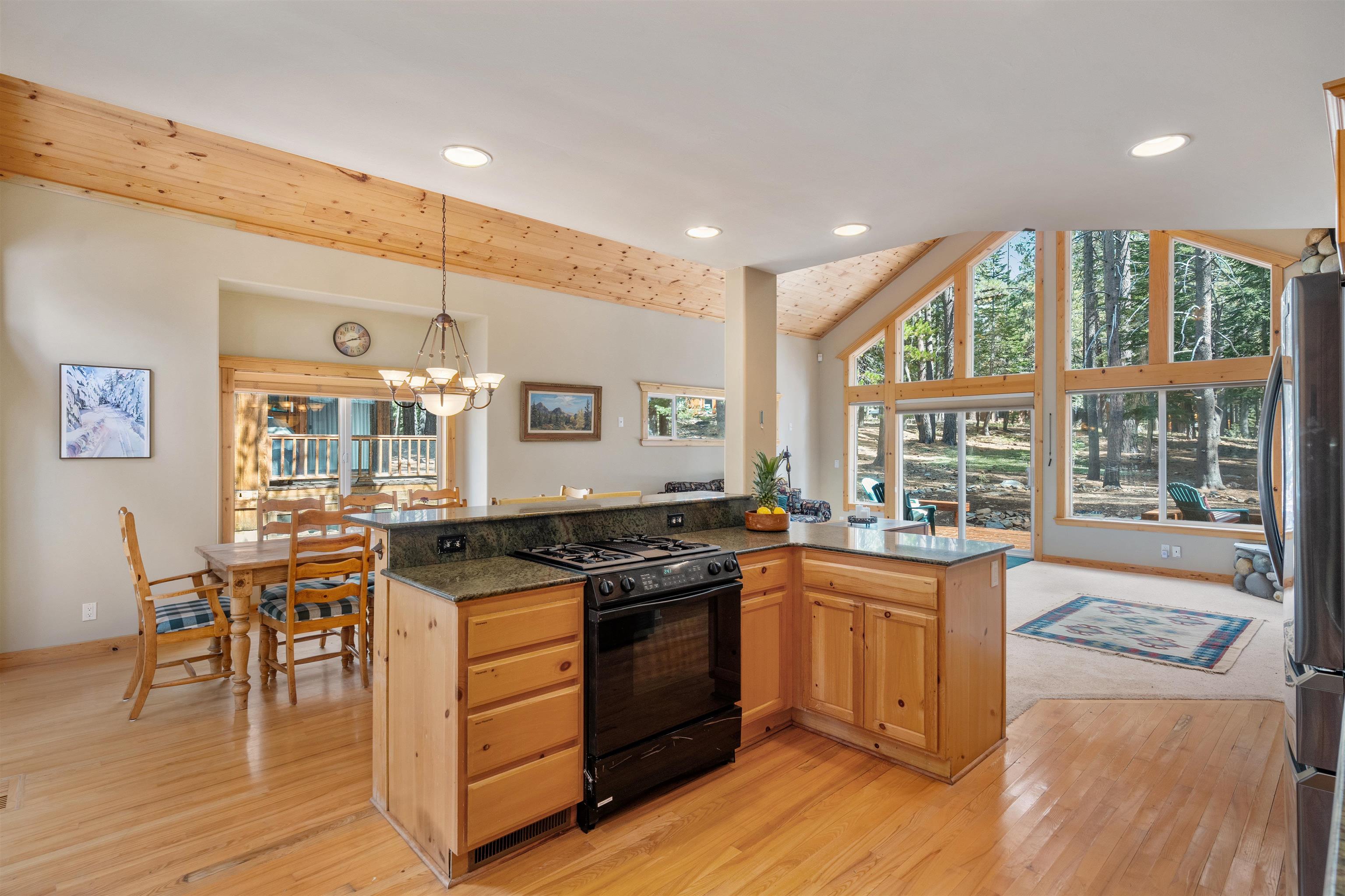 12851 Ski View Loop Truckee, CA 96161 - Photo 9 of 28 a kitchen with a stove a sink and a refrigerator