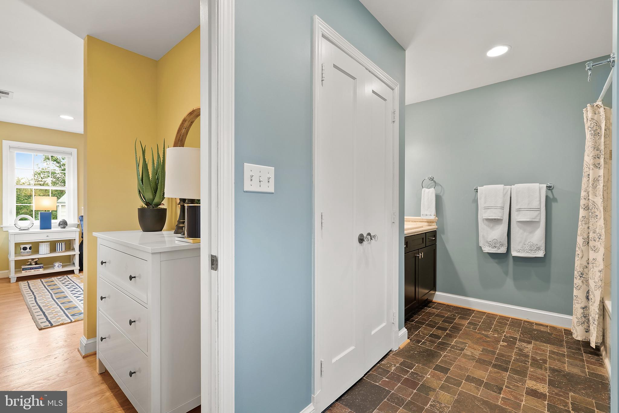 9100 Warren Street Silver Spring, MD 20910 - Photo 36 of 67 PRIMARY BATH WITH LARGE CLOSET & SLATE TILE FLOOR