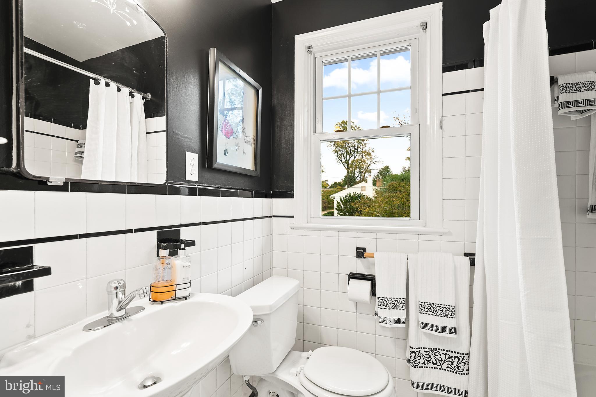 9100 Warren Street Silver Spring, MD 20910 - Photo 40 of 67 HALL FULL BATH WITH ORIGINAL BLACK & WHITE TILE