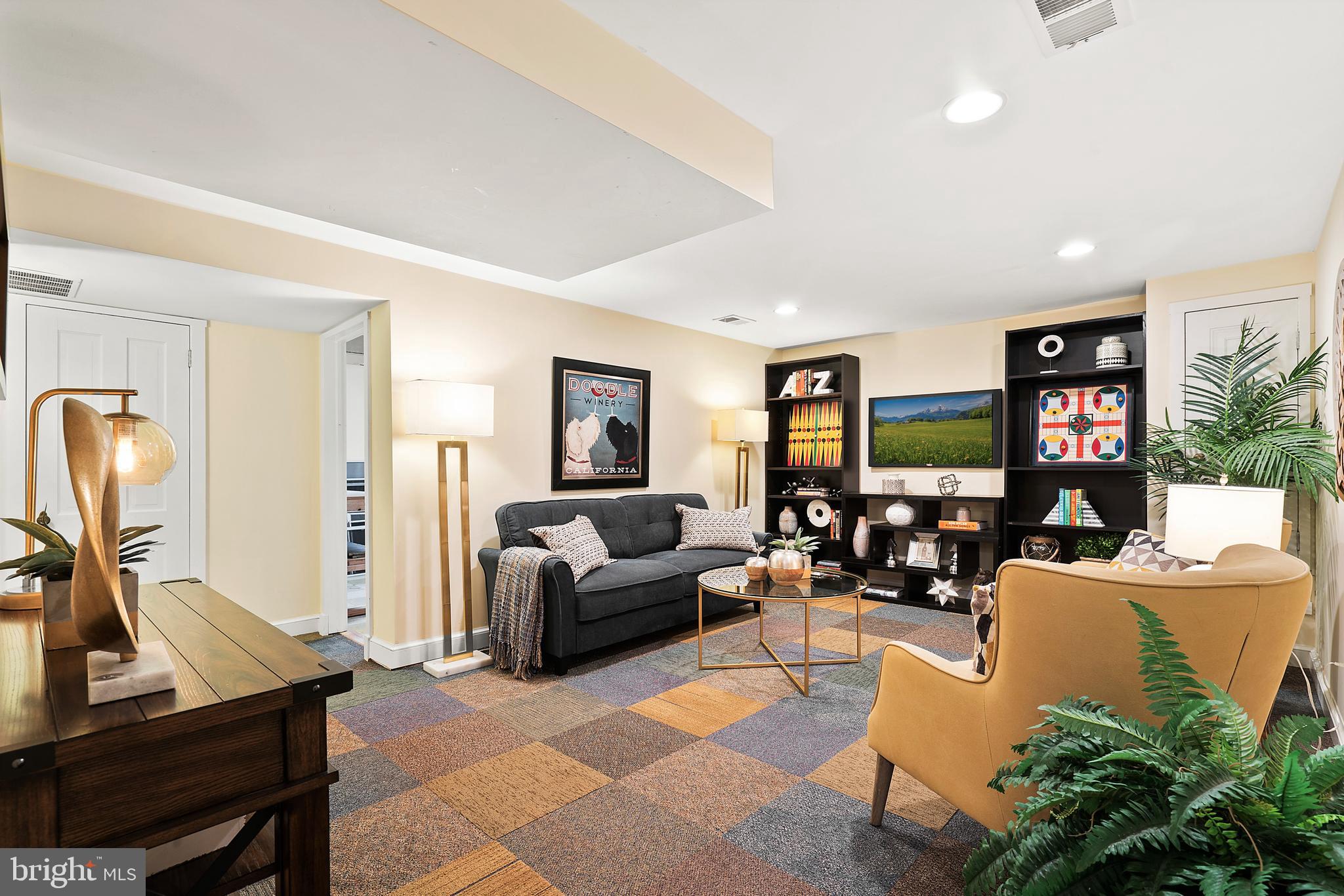 9100 Warren Street Silver Spring, MD 20910 - Photo 45 of 67 LOWER LEVEL REC ROOM WITH RECESSED LIGHTS
