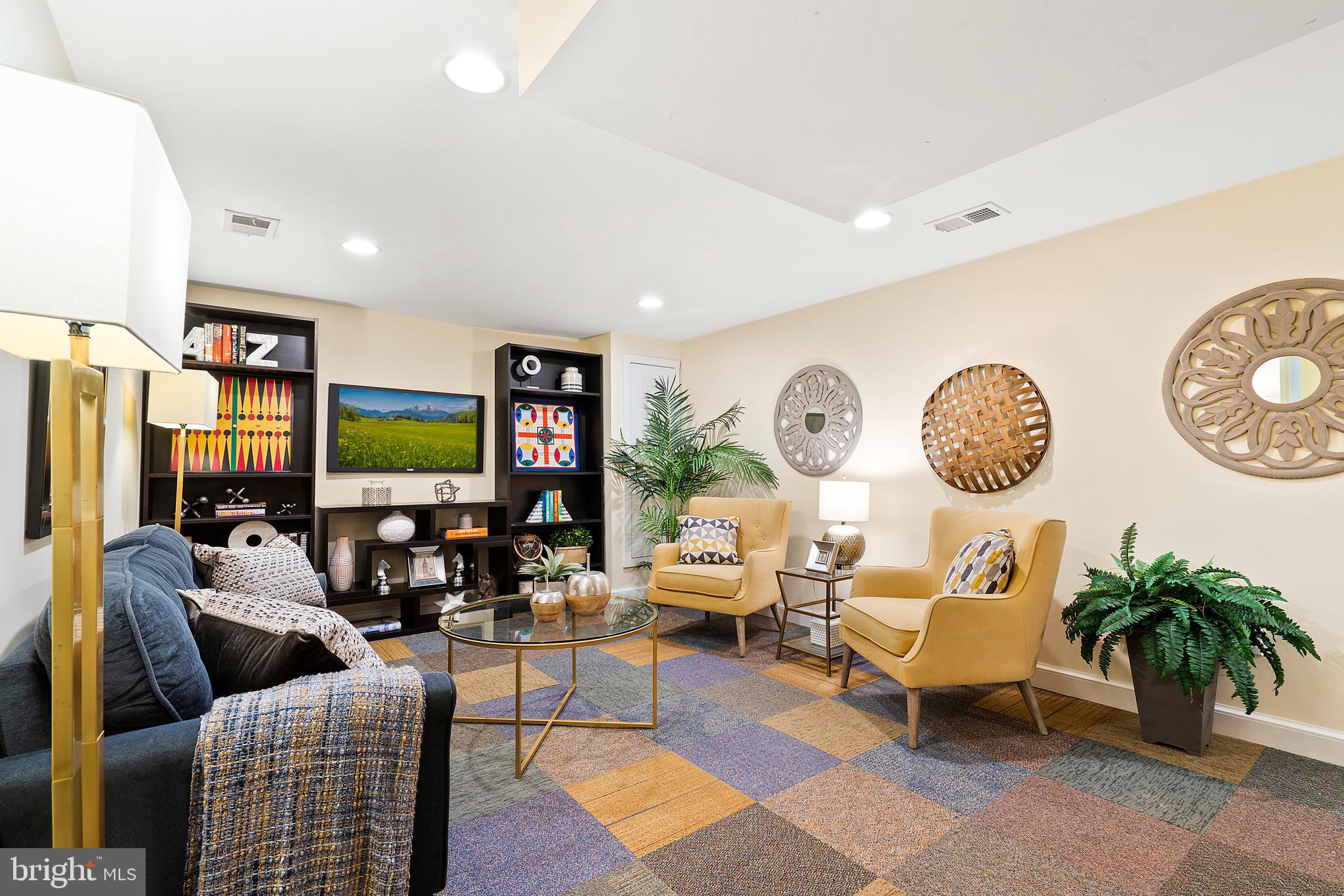 9100 Warren Street Silver Spring, MD 20910 - Photo 46 of 67 REC ROOM HAS CARPET TILES & ROOM FOR TV WATCHING