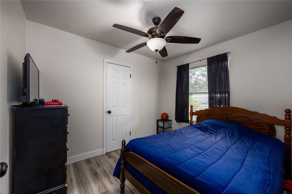15872 Southwest 133rd Lane Archer, FL 32618 - Photo 27 of 28 a bedroom with a bed and a window