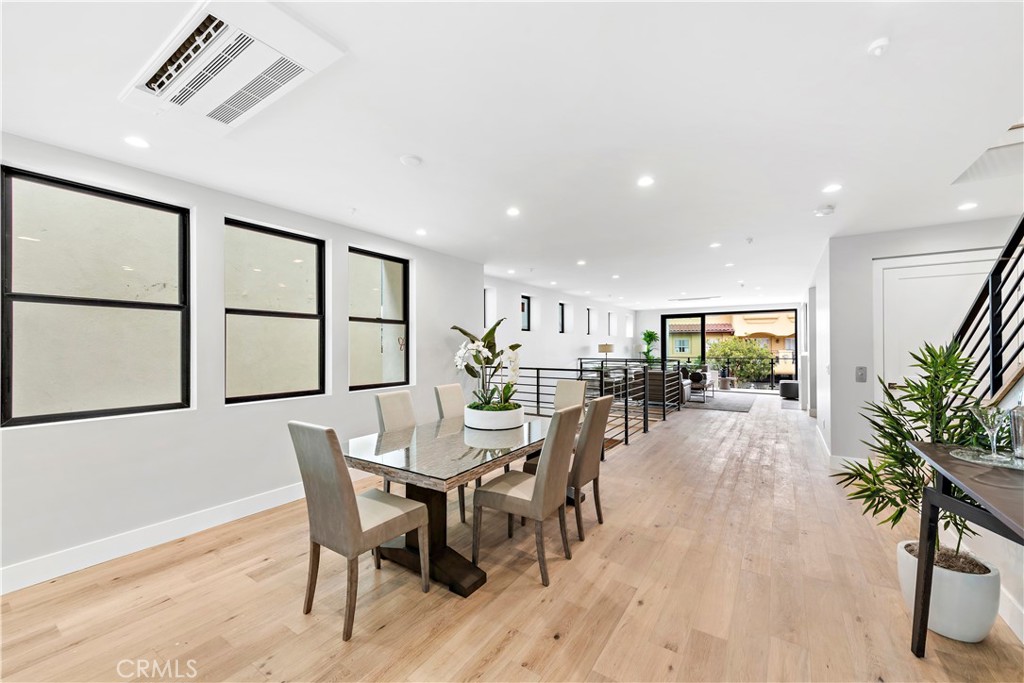 33889 Robles Drive Dana Point, CA 92629 - Photo 12 of 42 a view of a dining room with furniture and a large window