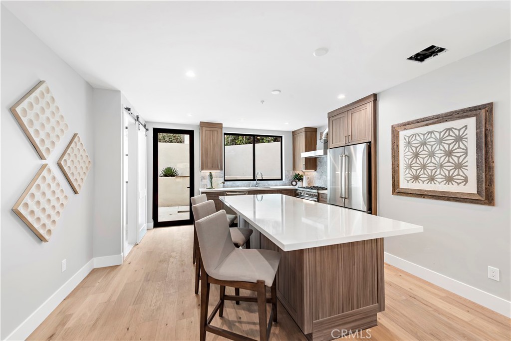 33889 Robles Drive Dana Point, CA 92629 - Photo 16 of 42 a dining room with furniture and window